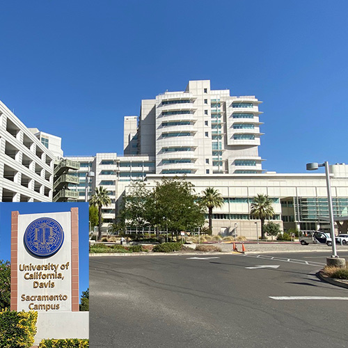 Exterior view of a multi-floor hospital building with a sign for university of California, Davis, Sacramento campus