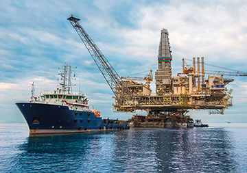 Ship Next To Oil And Gas Facility On Water